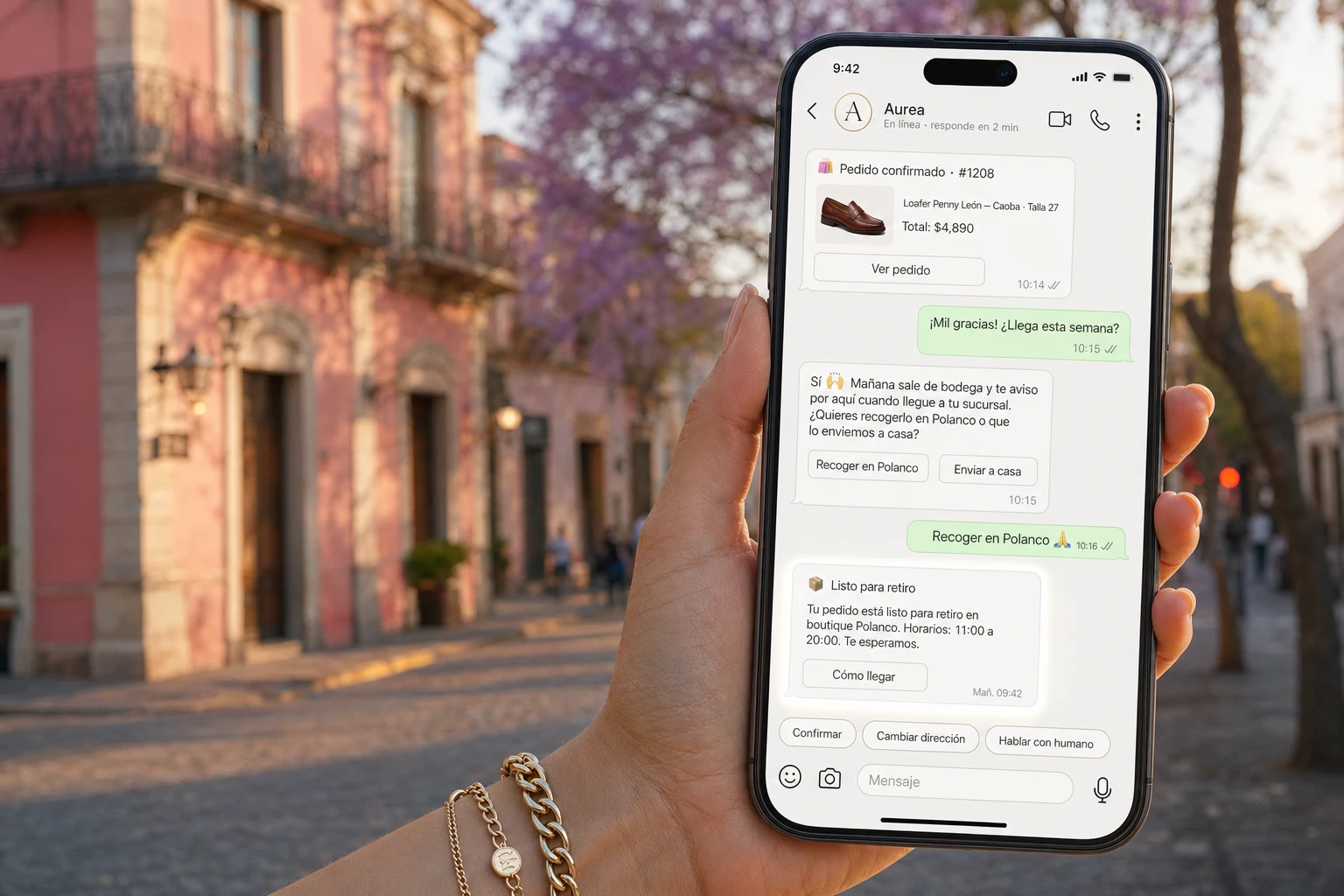 iPhone con chat de WhatsApp de Aurea con confirmación de pedido y aviso de retiro
